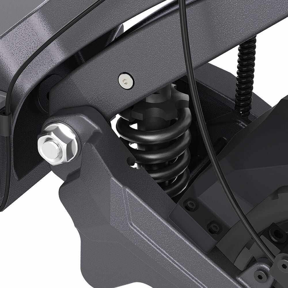 Dual rear spring suspension close-up on the Ausom DT2 Pro