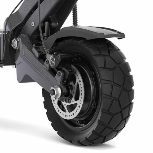 Rear wheel of the Ausom DT2 Pro — off-road tire, hub motor, and disc brake