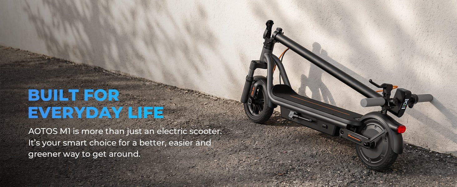 AOTOS M1 folding electric scooter parked against a sunlit wall