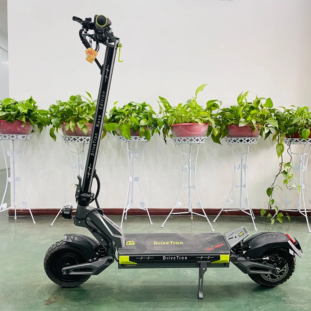 DriveTron Nova dual motor electric scooter, side view in grey with yellow accents