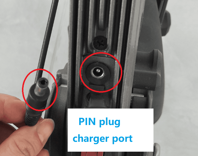 Pin plug charging port