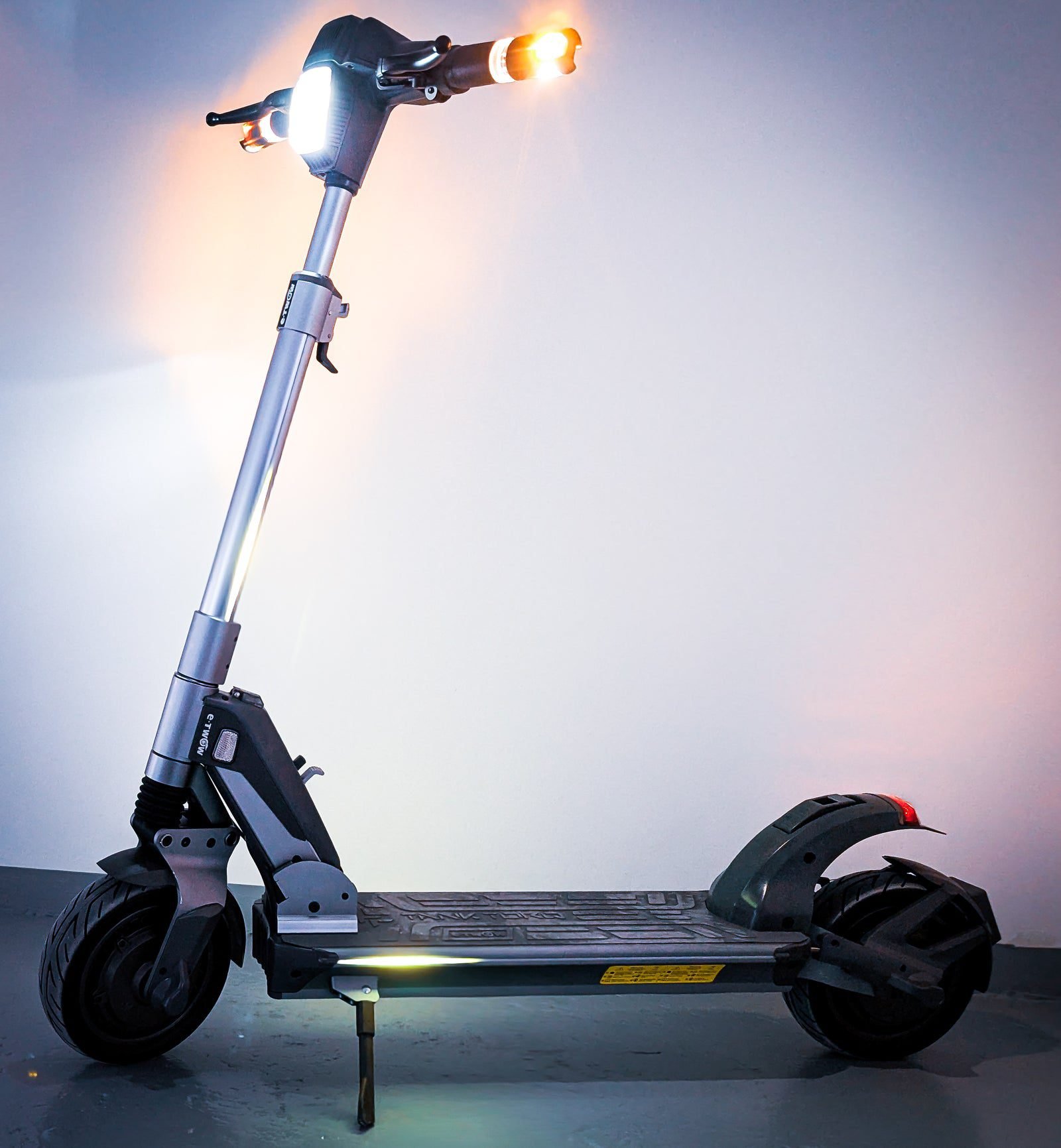 TankTorq TK3 electric scooter lights at night