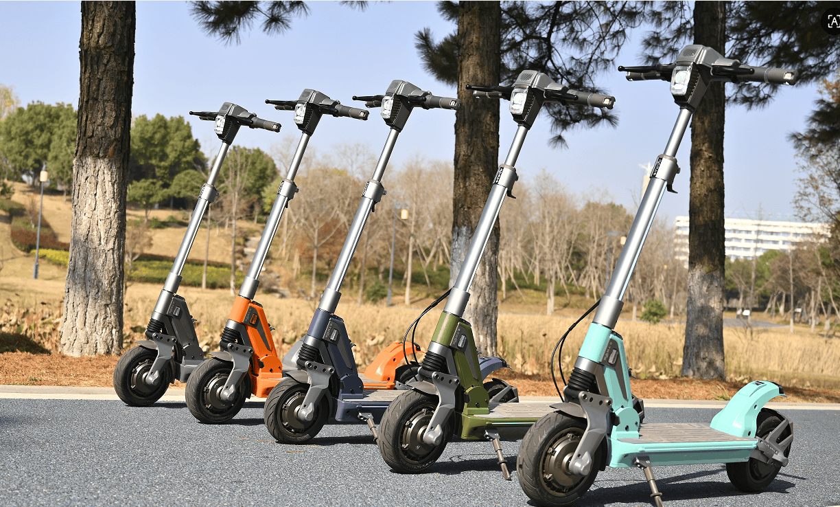 Five E-TWOW TankTorq TK3 electric scooters in a row