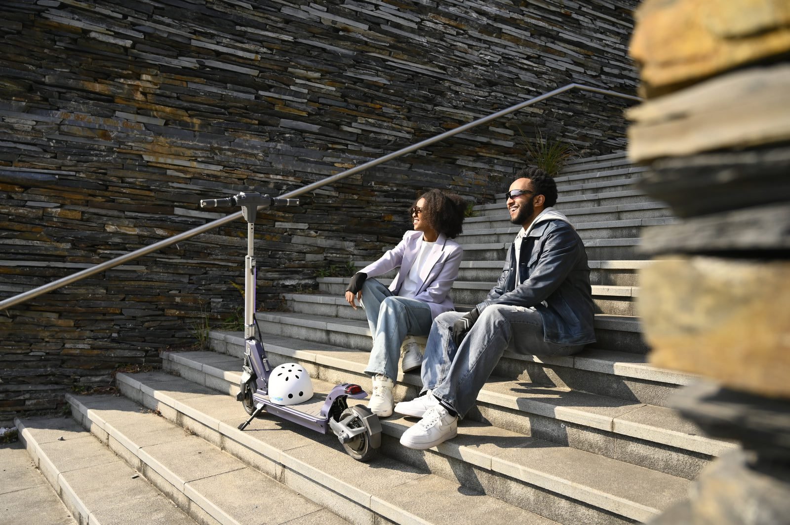 TankTorq TK3 electric scooter folded on steps