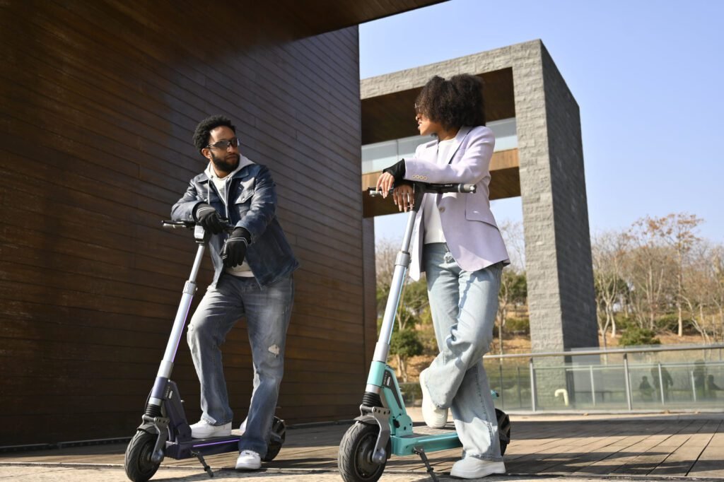 Two riders with TK3 electric scooters