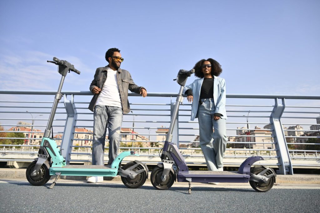 TK3 riders by a railing