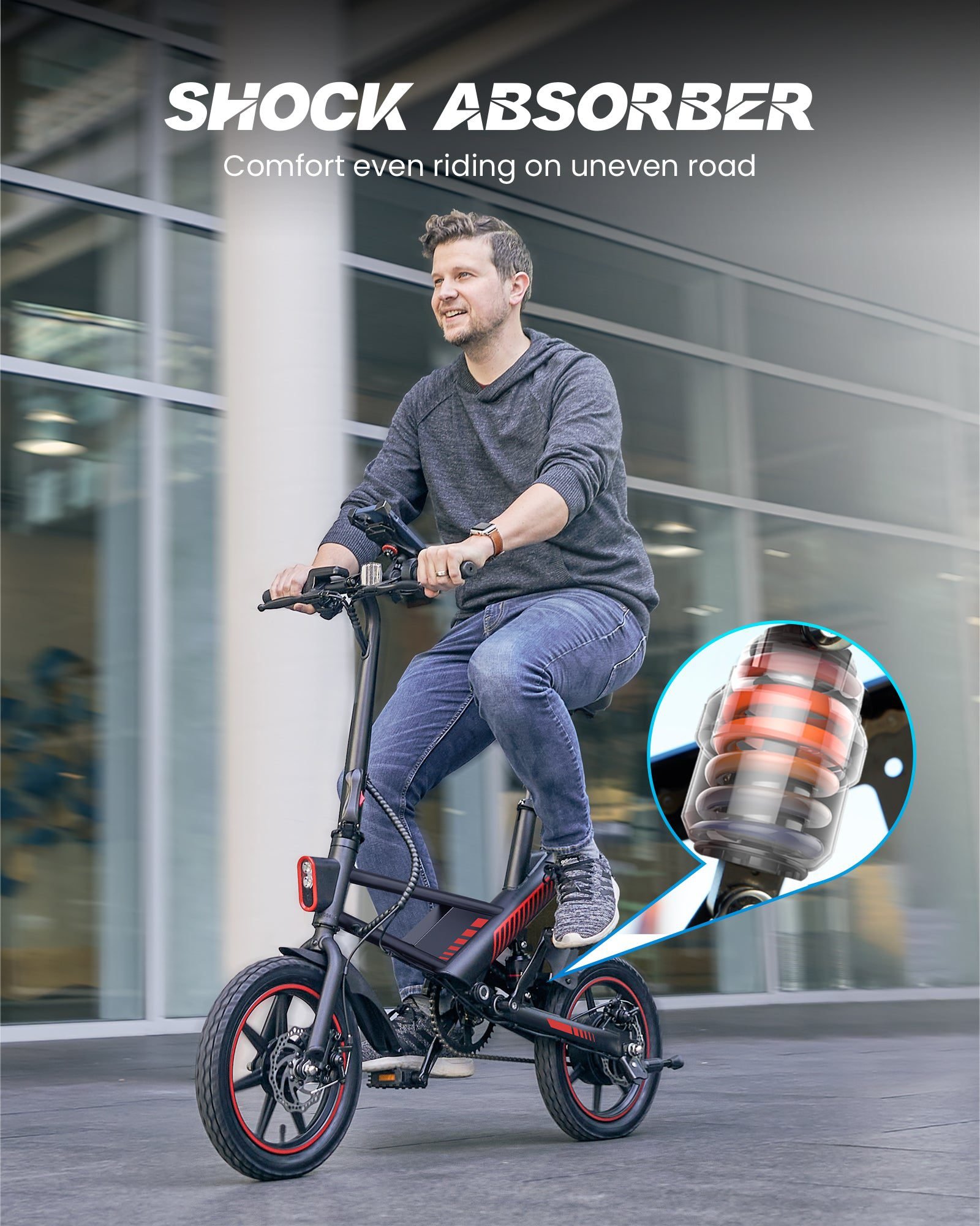 Rider on a 14-inch folding electric bike, with a close-up of the shock absorber
