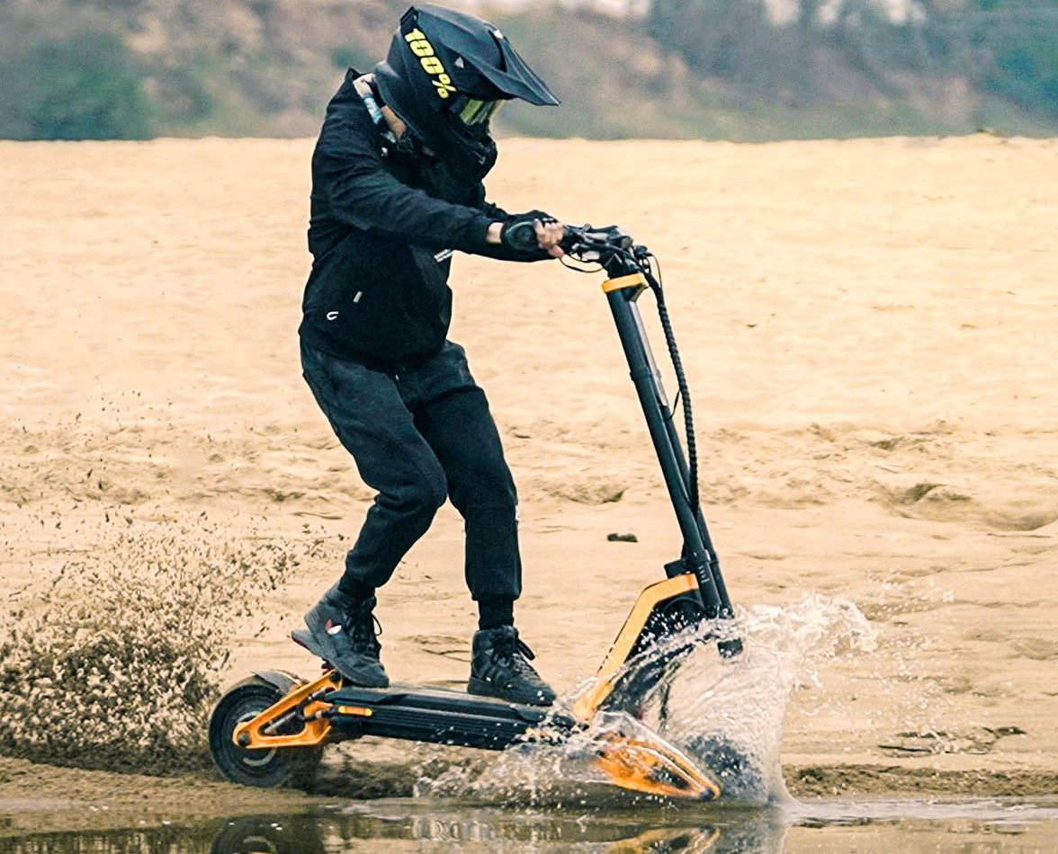 INMOTION RS long range off-road scooter in shallow water