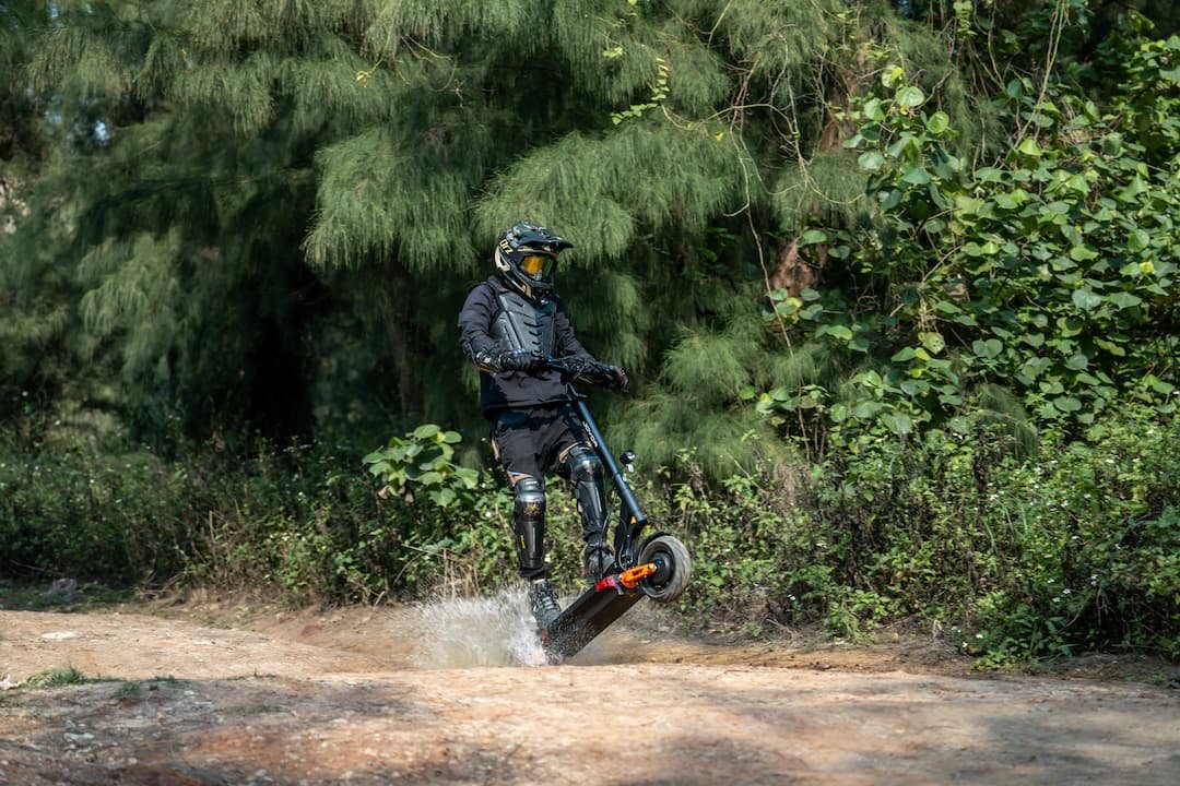 JOYOR T10 electric scooter on a dirt path