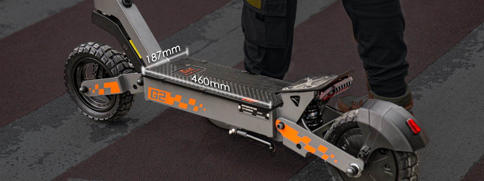 KUKIRIN G2 extra-long deck with a rider standing on it