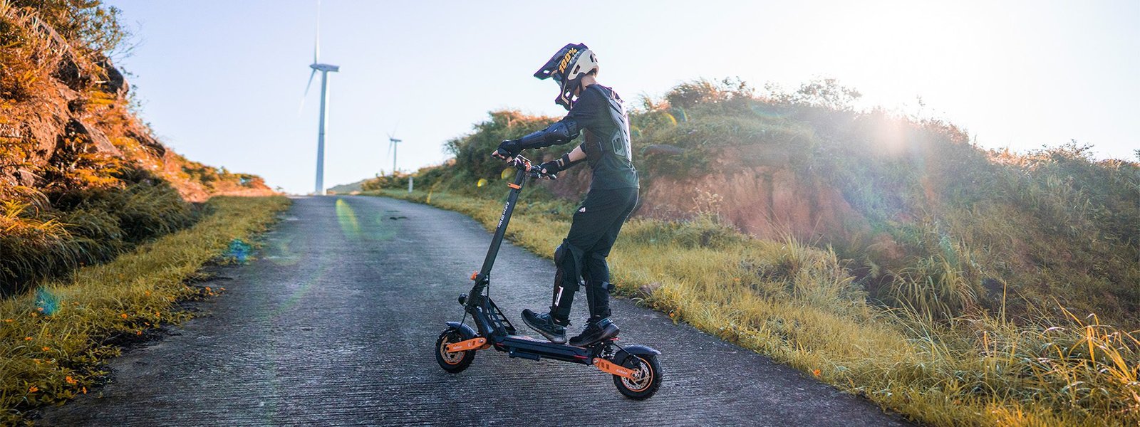 Rider climbing a hill road on the G2 Max