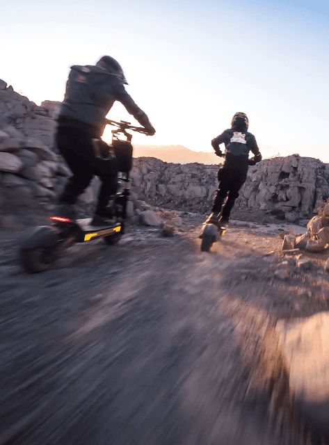 Rider on the G4 Max in a rocky canyon