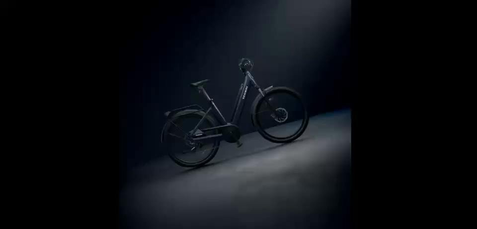 Myon electric bike riding through town