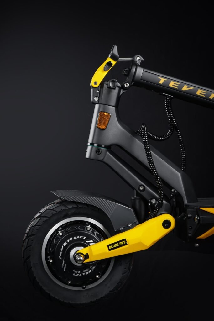 Folded Blade Mini electric scooter in a car trunk