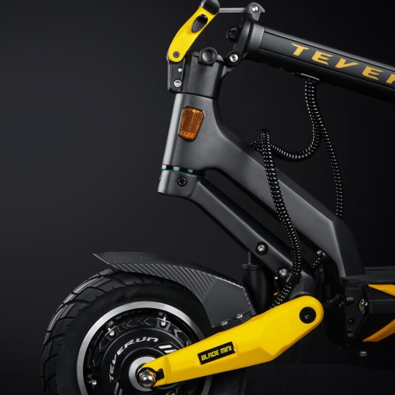 Folded Blade Mini electric scooter in a car trunk