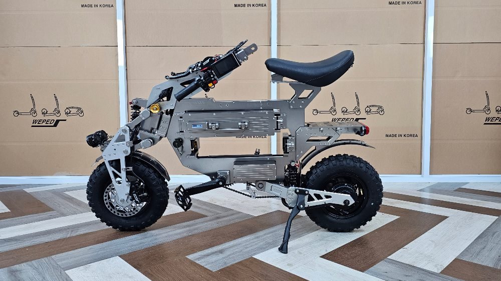 WEPED Mini Mong electric scooter with handlebar folded down