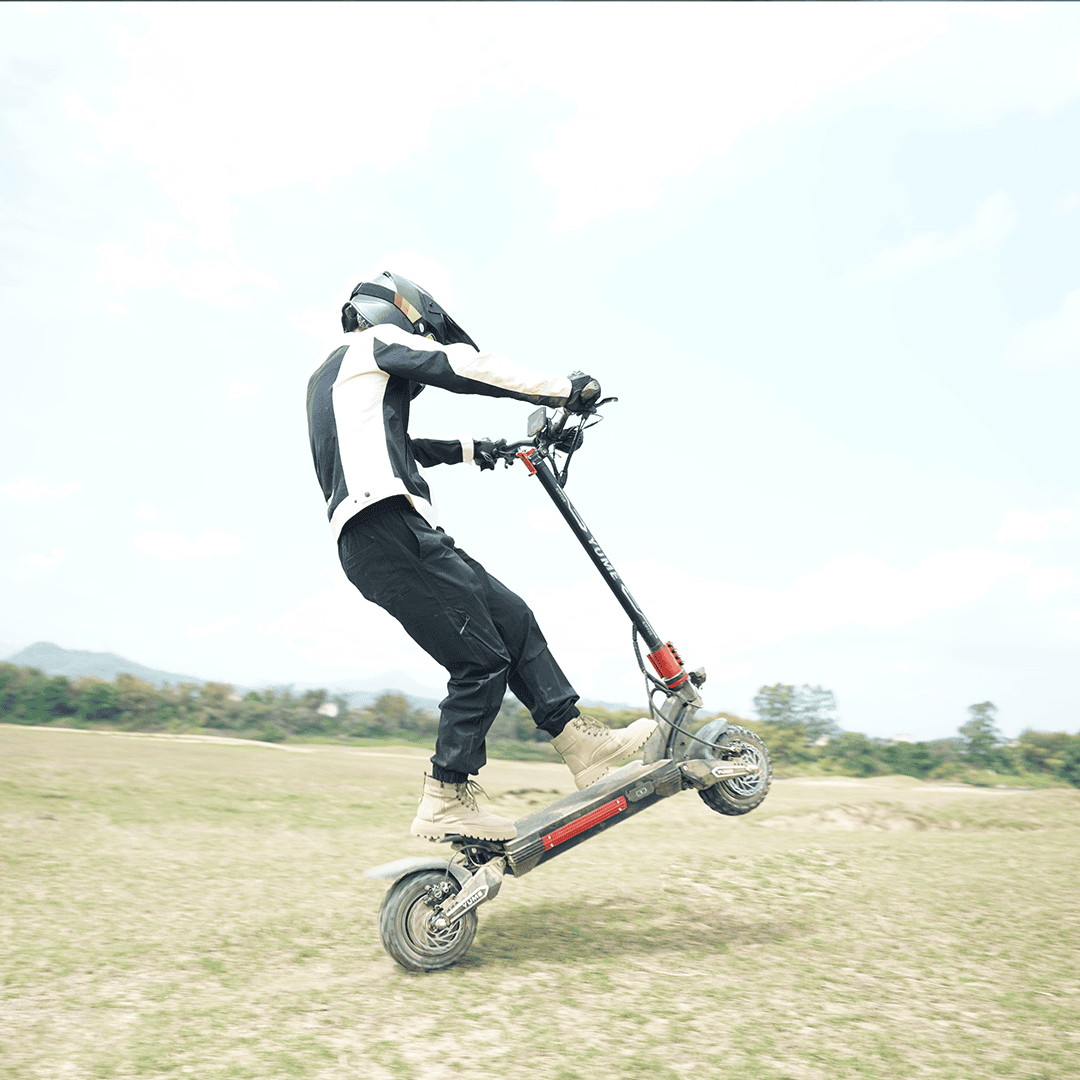 YUME Raptor2 13 MPH Speed-Limited Electric Scooter riding